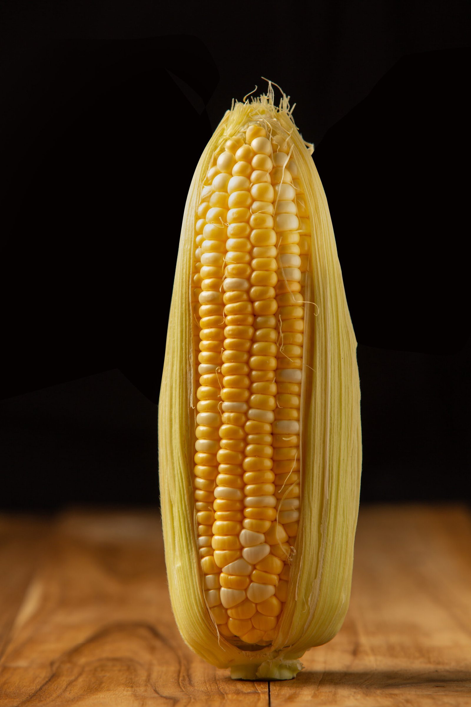 sweet corn placed wooden floor scaled.jpg